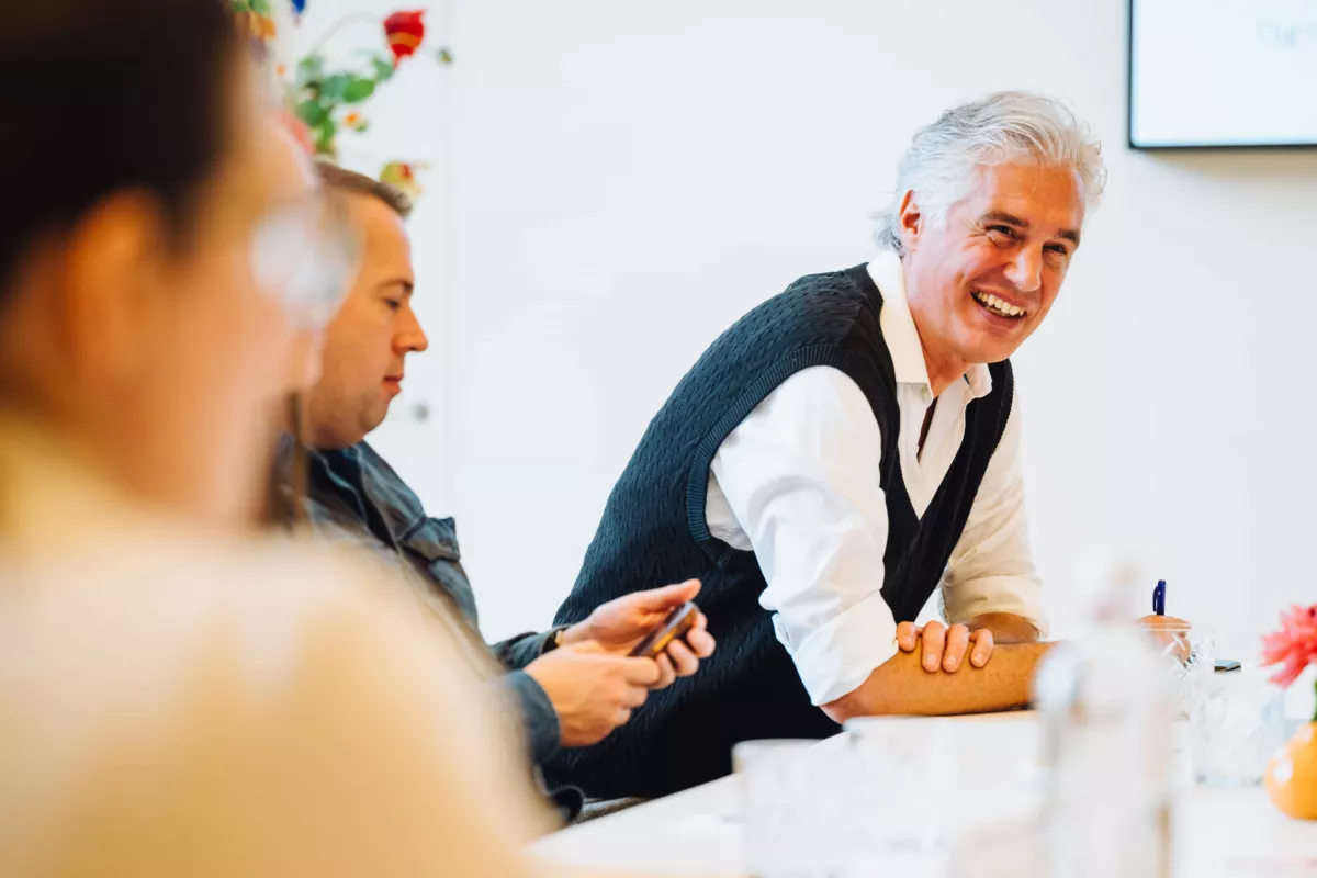 Mensen tijdens een workshop van DEN